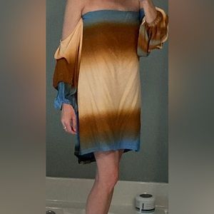 NWT!  Never worn- Beautiful MLM Label dress Med. Hidden pockets. Elastic back.